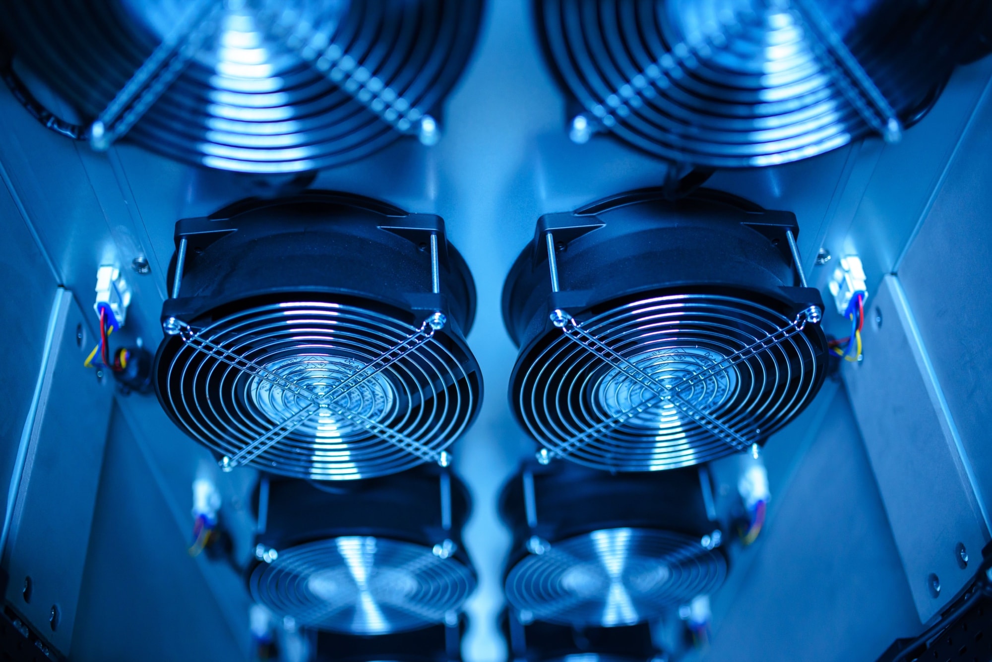 Banks of cooling fans inside the AfWS glycol loop, lit blue.